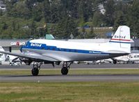 N814CL @ BFI - This DC-3 of Clay Lacy Aviation is painted in United colors and is a popular guest at airshows and other aviation arrangements.  Here on display at the Boeing Field Museum of Flight, May 2004. - by Andreas Mowinckel
