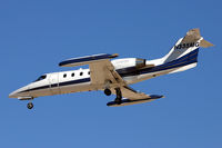 N335MG @ LAS - Looks like long range wing tanks on this good looking Learjet. - by Kevin Murphy