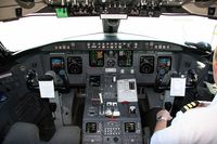 N964CA @ CVG - The flight deck of N964CA (I sit on the left.) - by Lee Mills