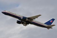 N584UA @ LAX - Departing RWY 25R. - by Dean Heald