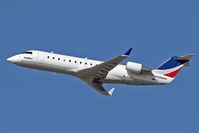 N699BR @ LAX - Skywest N699BR departing RWY 25R on a clear Saturday in late November. - by Dean Heald