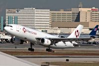XA-TWQ @ LAX - Aero Union XA-TWQ (Tata) departing RWY 25L on a November day. - by Dean Heald
