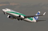 PH-HZV @ LAX - Sun Country PH-HZV departing LAX RWY 25R. - by Dean Heald