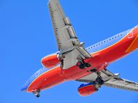 N515SW @ KLAS - Southwest Airlines / 1991 Boeing 737-5H4 / If you look close, you can see somebody looking back at you out one of the rear windows! Looking for a slot machine no doubt. - by Brad Campbell