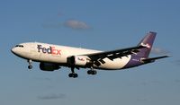 N667FE - landing 04 - by scott kerhaert