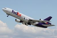 N562FE @ LAX - FedEx N562FE (FLT FDX3019) climbing out from RWY 25L enroute to Chicago Ohare Int'l (KORD), Illinois. - by Dean Heald