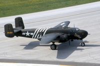 N5548N @ KCID - Taxiing by the control tower - by Glenn E. Chatfield