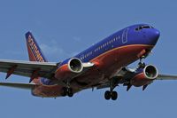 N496WN @ LAX - Southwest Airlines N496WN (FLT SWA2537) from Las Vegas McCarran Int'l (KLAS) on final approach to RWY 24R. - by Dean Heald