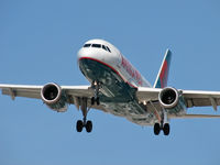 N830AW @ KLAS - America West Airlines / Airbus Industrie A319-132 / Co-Pilot hand on the dash. - by Brad Campbell