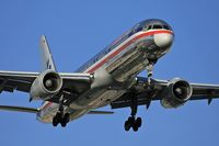 N680AN @ LAS - American Airlines N680AN (FLT AAL966) from Miami Int'l (KMIA) on final approach to RWY 25L.  The reflections from the fuselage are distracting, yet show the conditions at the moment the photo was captured. - by Dean Heald