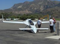 N57LG @ SZP - 1983 Godsey/Klaus Savier modified Rutan VARI-EZE, Continental O-200 100+ Hp, this World record speedster always attracts attention, Klaus owner/modifier of Light Speed Engineering, Inc. in shorts, refueling - by Doug Robertson