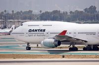 VH-OJR @ LAX - Qantas VH-OJR (FLT QFA25) holding short of RWY 25R on Taxiway Tango after arriving on RWY 25L from Auckland, New Zealand (NZAA). - by Dean Heald