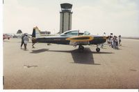 N8600H @ CMA - 1947 North American NAVION, Continental E-185-9 205 Hp for takeoff, CMA Tower in background - by Doug Robertson