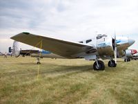N44638 @ KOSH - Beech D18S - by Mark Pasqualino