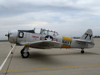 N116SE @ MER - North American T-6G (49-3302) painted as SNJ-5 7Y/0 Grosse Isle (not 7Y/30 as 2005) in abysmal weather @ Castle AFB, Merced, CA - by Steve Nation