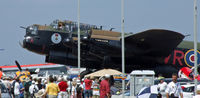 C-GVRA @ OSH - Up-Front the Lanc drew a crowd immediately - by Jim Uber