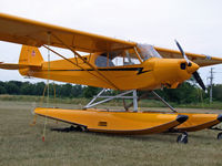 N418BD @ OSH - A Cub on floats, in the North 40 - by Jim Uber