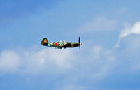 N1157H @ OSH - Yak-9 makes a pass over Airventure - by Jim Uber