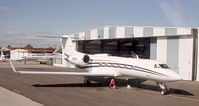 N20EG @ ISP - EG gets a landing light replaced on the A&P ramp.... - by Stephen Amiaga