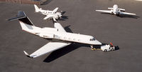 N900TJ @ ISP - At the Garrett Ramp, 900TJ readies for pushback... - by Stephen Amiaga