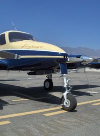 N6817T @ SZP - 1960 Cessna 310D Songbird III, retractible nose gear with shimmy damper - by Doug Robertson