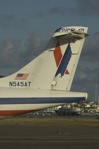 N545AT @ SXM - tail of an American Eagle ATR72 - by Yakfreak - VAP
