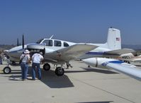 N925DJ @ CMA - 1958 Beech D50A TWIN BONANZA (T-BONE), two Lycoming geared GO-480-G2F6 295 Hp each, 3-blade Hartzell props standard on D50 model. 5 seats, 3 in front, 2 behind - by Doug Robertson