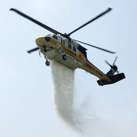 N190LA - LA County Copter 19 dropping water at Camp 2 press conference - by Doug Pearson