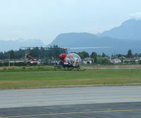 C-GSKY @ YPK - Bell 47G hovering at Pitt Meadows - by William Kelly
