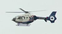 N137LN - Life Net medical helicopter hovers over the Delaware River, just off Philadelphia's scenic waterfront. - by Daniel L. Berek