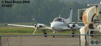 N74ET @ PVG - Blades whirling to a stop after having her tanks topped up - by Paul Perry