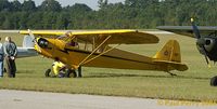 N88490 @ W03 - Another bright Cub flying in to Wilson - by Paul Perry