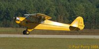 N42500 @ W03 - Just flew in, about to put the tailwheel on the runway - by Paul Perry