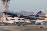 N787UA @ LAX - United Airlines N787UA (FLT UAL934) departing RWY 25R enroute to London Heathrow (EGLL) a few minutes before sunset. - by Dean Heald