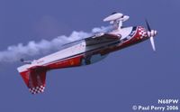 N68PW @ NTU - Patty hanging by her straps during an inverted pass - by Paul Perry