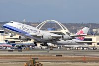 B-18215 @ LAX - China Airlines B-18215 (FLT CAL5) climbing out from RWY 25R enroute to Chiang Kai Shek Int'l (RCTP). - by Dean Heald