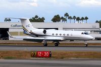N77WL @ LGB - 1990 Gulfstream G-IV on RWY 12 after arrival from John Wayne Airport Orange County (KSNA). - by Dean Heald