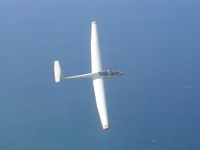 N928BG @ PHDH - Over Hawaii's north shore - by Rob Krieg