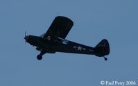 N87869 @ W03 - Headed home, a very clean L-21 FAC bird - by Paul Perry