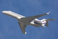 VH-TGG @ LAX - Mid-afternoon departure from RWY 25R for this Australian-registered 2004 Bombardier Global Express. - by Dean Heald