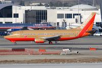 N345SA @ LAX - Southwest Airlines N345SA (FLT SWA497) exitting RWY 25R after arrival from Tucson Int'l (KTUS). - by Dean Heald