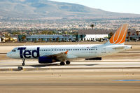 N458UA @ LAS - TED taxi at McCarran - by John Little