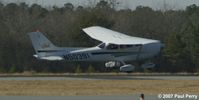 N50391 @ ISO - Dipping the wing a bit just after rotating - by Paul Perry