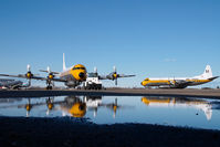 C-GZVM @ CYQF - Air Spray Lockeed Electra - reflection - by Yakfreak - VAP