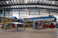 C-FLJO @ CYQF - Air Spray Lockheed Electra still in NASA cs - by Yakfreak - VAP