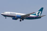 N313AT @ LAX - AirTran Airways N313AT (FLT TRS47) from Hartsfield Jackson Atlanta Int'l (KATL) on short-final to RWY 24R. - by Dean Heald