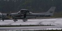 N678SP @ PVG - Offloading amidst the rainy spell - by Paul Perry