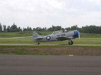 N365TA @ KLVN - Taxiing out for a fly-over at the Memorial Day Open House at Airlake. - by Mitch Sando