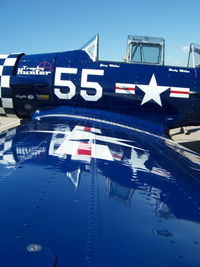 N7648E @ KBJC - Trophy Hunter Wing View - by Bluedharma