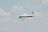 N2872K @ KFTG - Jump Plane Landing - EAA - 2006 - by John Little